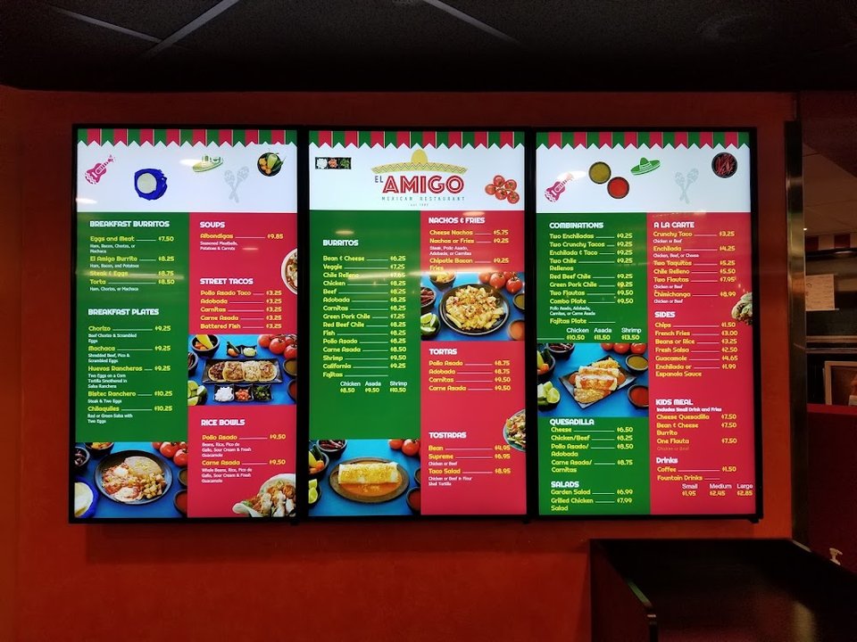Breakfast burrito and taco sections on a menu.